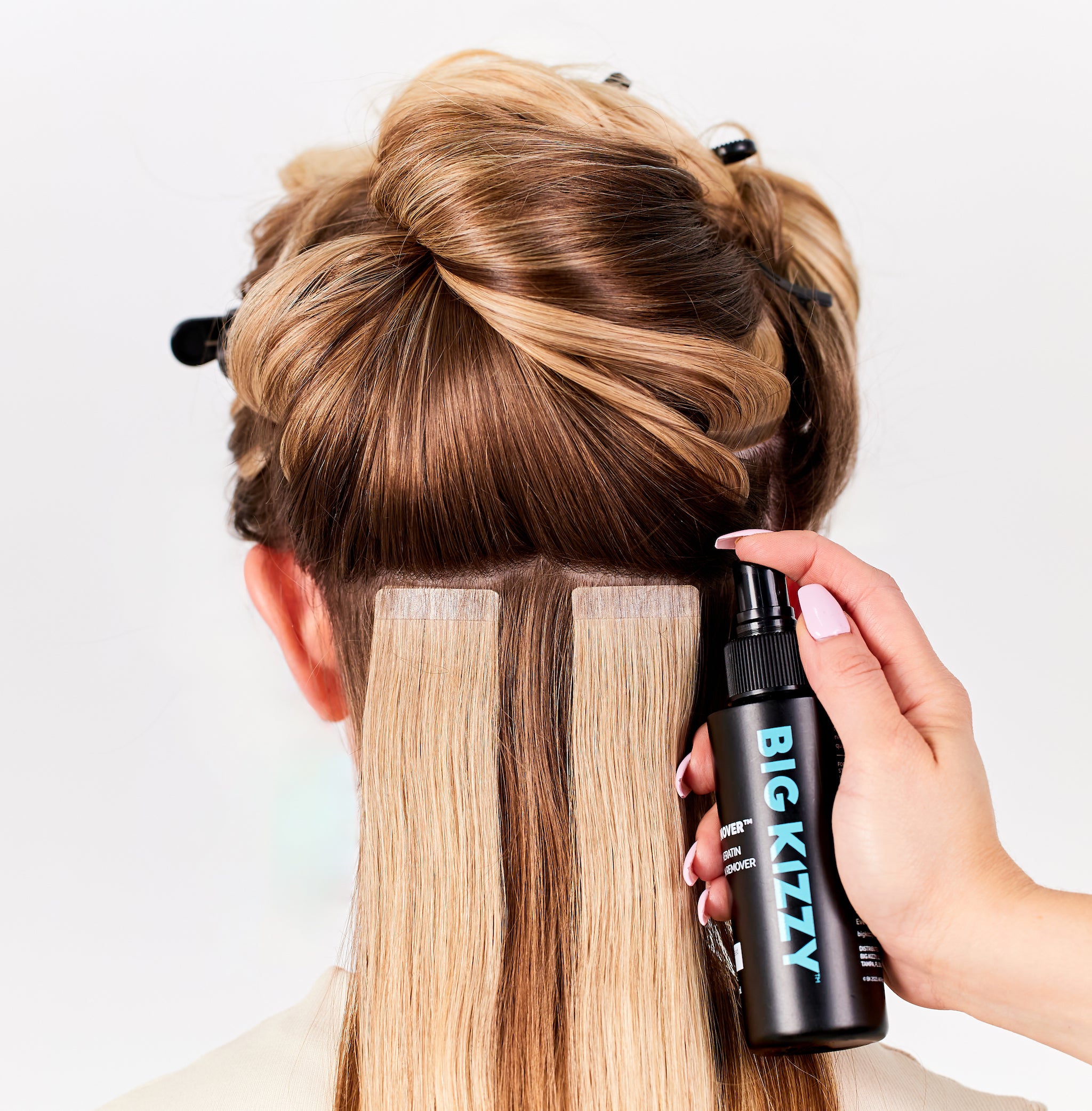 Removing Tape In Hair Extensions Using Big Kizzy® Pro Remover™ Tape In &amp; Keratin Hair Extension Remover Spray